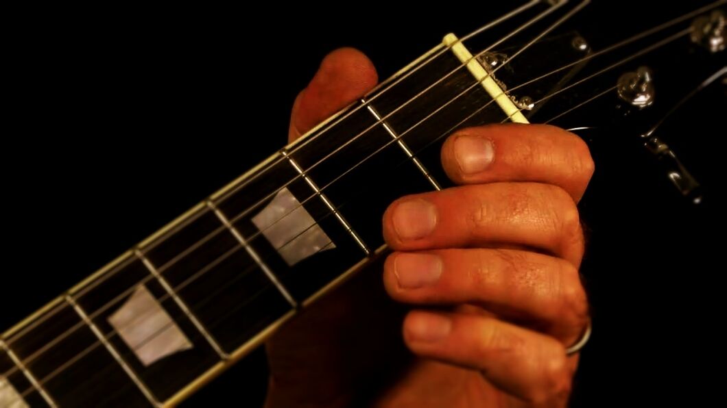 Which Acoustic Guitar Has the Widest Neck