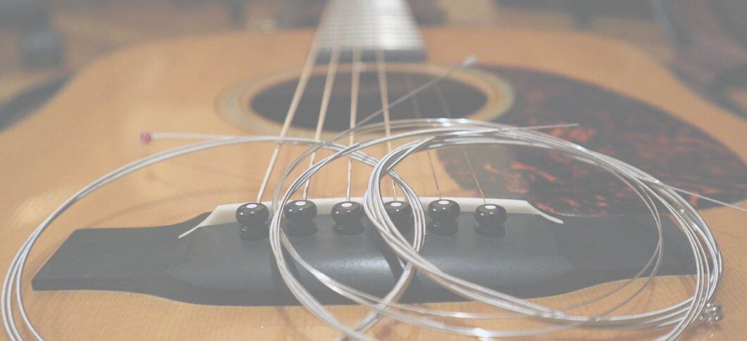 Can You Put Acoustic Guitar Strings on an Electric Guitar
